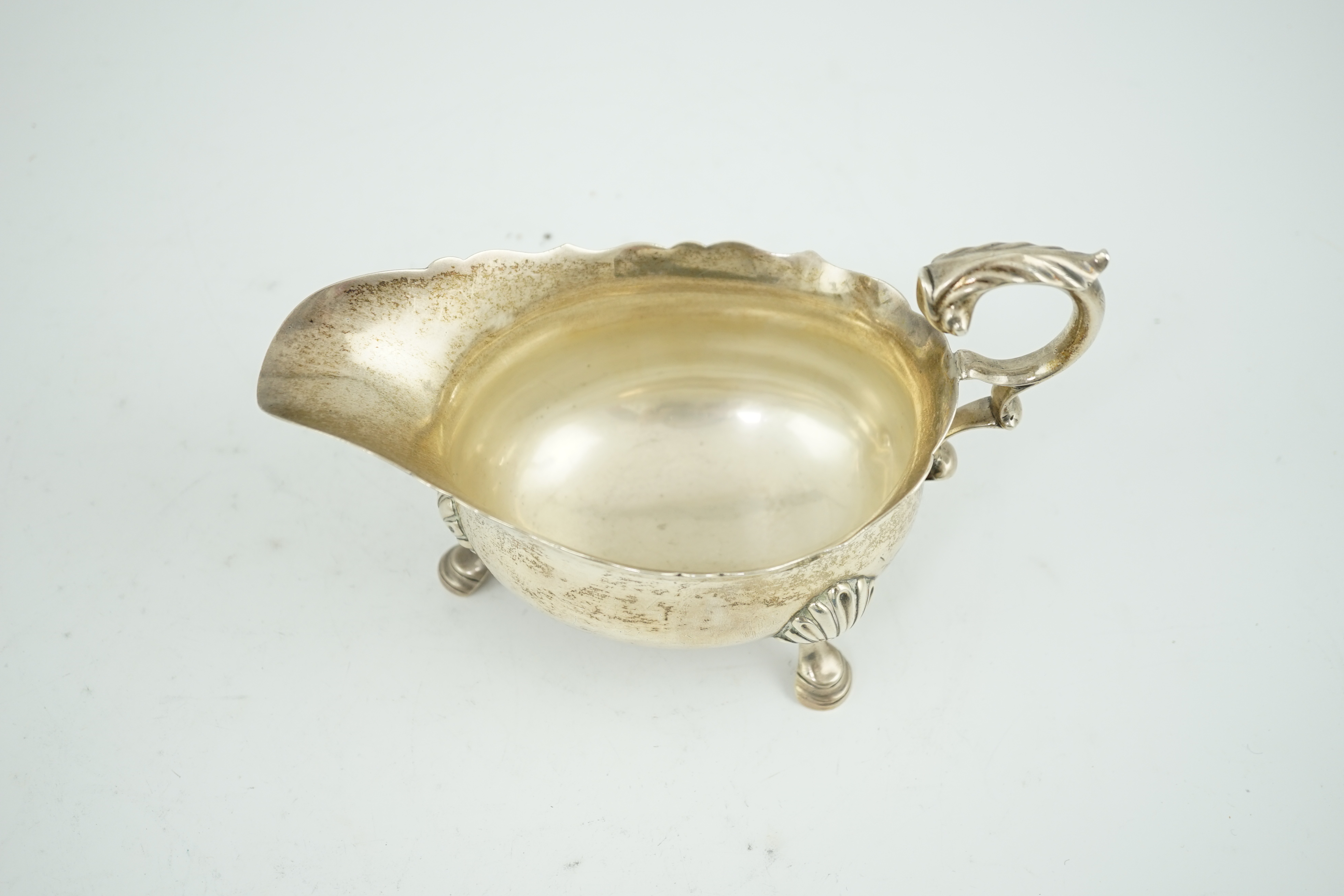 A George V silver sauce boat, by Edward Barnard & Sons Ltd